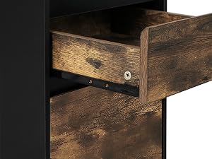 Close-up of a rustic wooden drawer with dark weathered finish, partially pulled out from a black frame or cabinet.