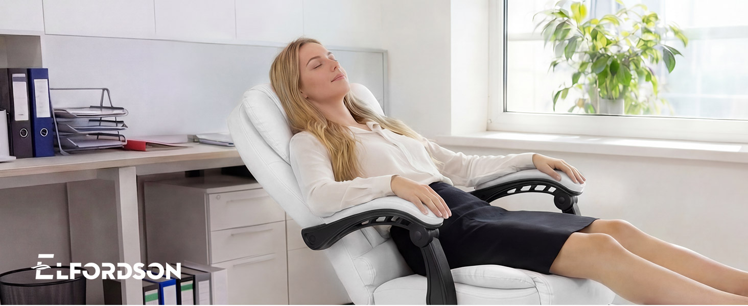 Text reads 'ELFOSSON'. Person relaxing on black massage or reclining chair by window with plant in bright, minimalist room setting.