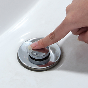 sortir en le poussant pour agir comme un bouchon de baignoire