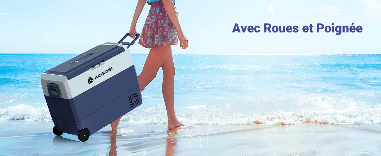 Personne tirant une glacière à roues bleues et blanches sur une plage. Texte « Avec Roues et Poignée » (avec roues et poignée