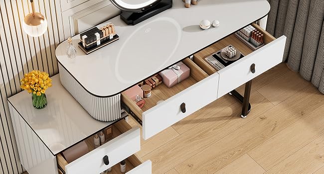 White vanity table with three storage drawers opened to display organized makeup and accessories. Features ribbed textural detail and wooden legs.