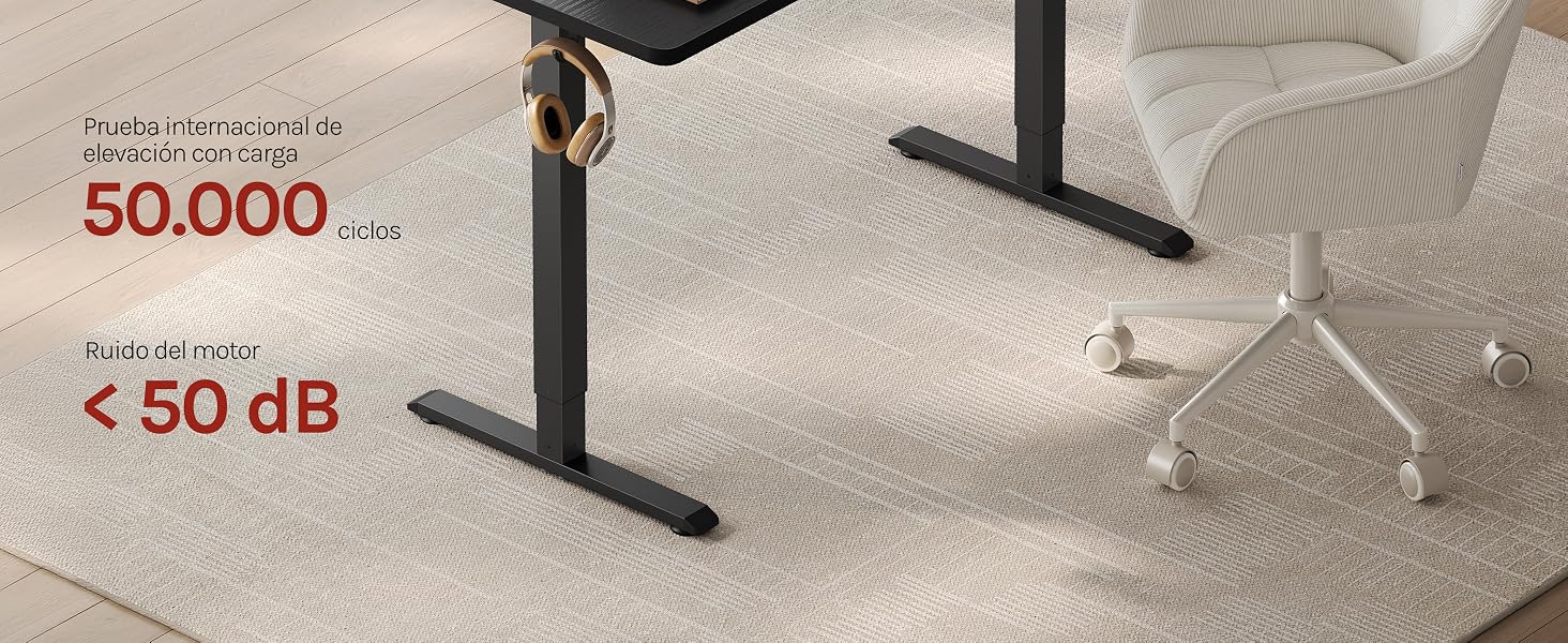 El texto dice «50 000...» y «< 50 dB». La imagen muestra un moderno marco de escritorio negro y metálico ajustable en altura con un diseño minimalista sobre un suelo claro.