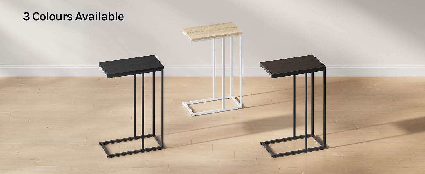 Three C-shaped side tables with flat tops and rectangular bases. Available in black and white finishes. Minimalist design suitable for placing next to sofas or chairs.
