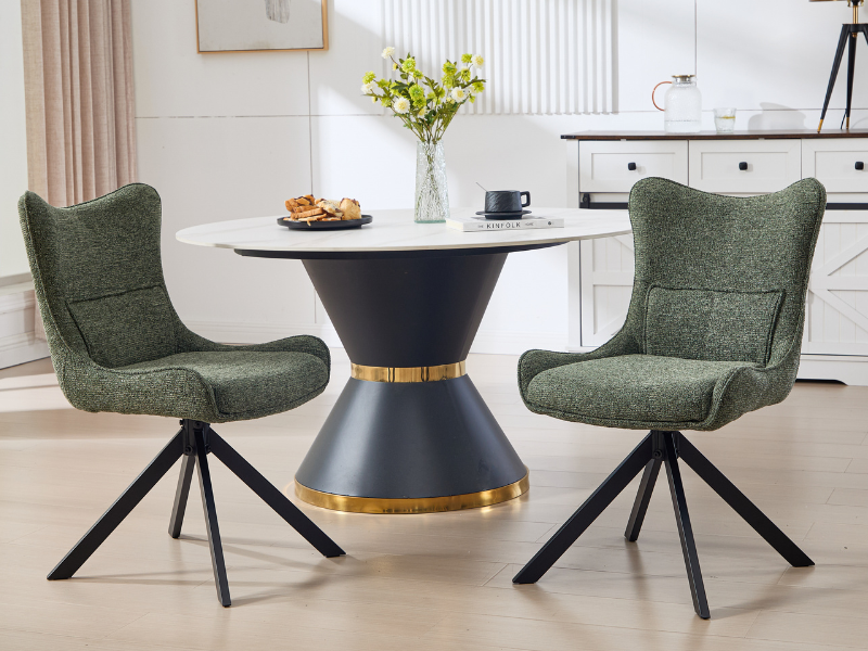 Modern living room set featuring olive green upholstered accent chairs with swivel bases, arranged around a circular table with gold accents.