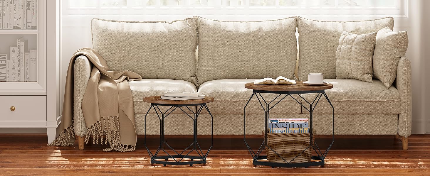Cream-colored textured sofa with throw blanket, paired with two industrial-style metal side tables in a sunlit room.