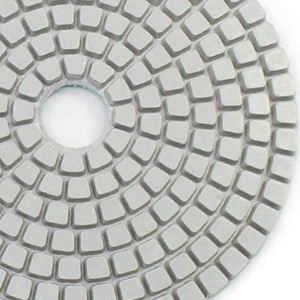 Tampons abrasifs plus un tampon d'appui