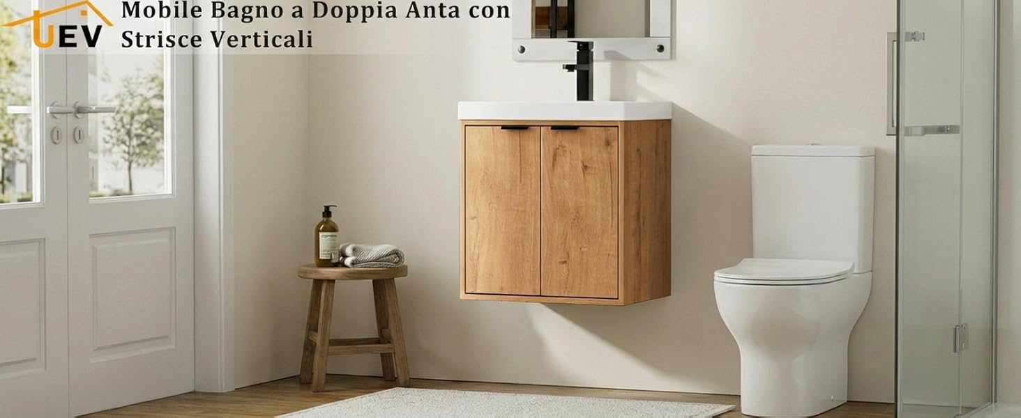 Il testo recita «Mobile Bagno e Doppia Asta con Attacco Verticali». Bagno interno moderno con mobiletto lavabo in legno a parete e wc bianco.