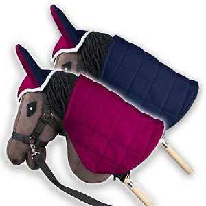 Two hobby horses with blankets and fly covers. Blanket 1 is fuchsia, blanket 2 is navy blue.