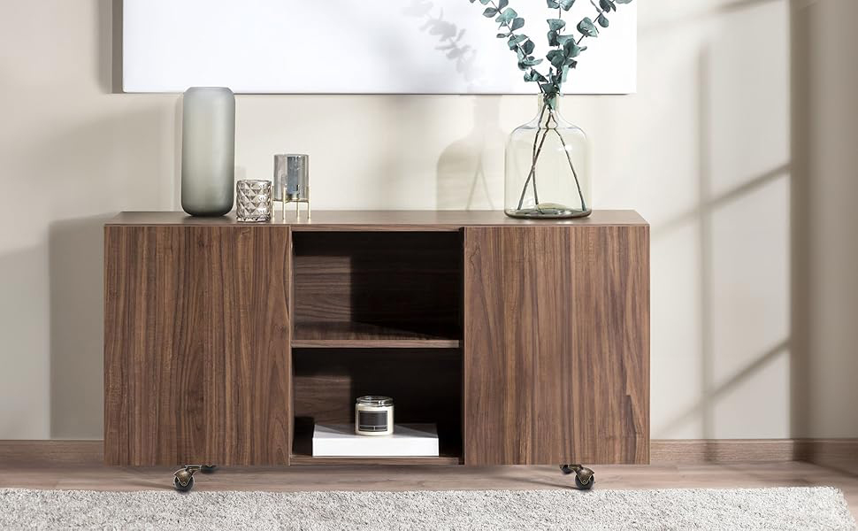 Modern wall-mounted storage unit in dark wood finish with clean lines. Floating cabinet design against white wall, styled with minimal decorative elements.