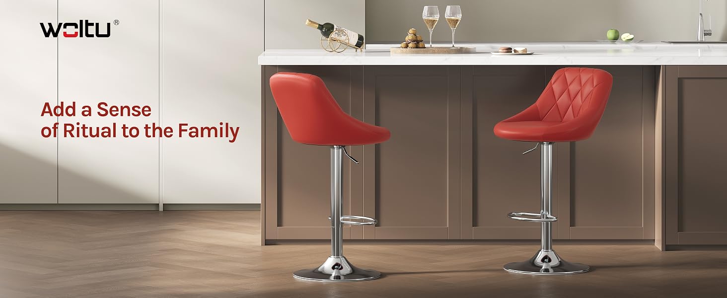 Text reads 'weitu' and 'Add a Sense of Ritual to the Family'. Two red upholstered bar stools with chrome metal legs positioned at kitchen counter with dark cabinetry.
