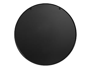 Objeto circular negro montado en la pared con superficie lisa. Dos pequeños orificios visibles cerca del borde superior, posiblemente para el montaje. Parece estar hecho de un material sólido con un acabado mate.
