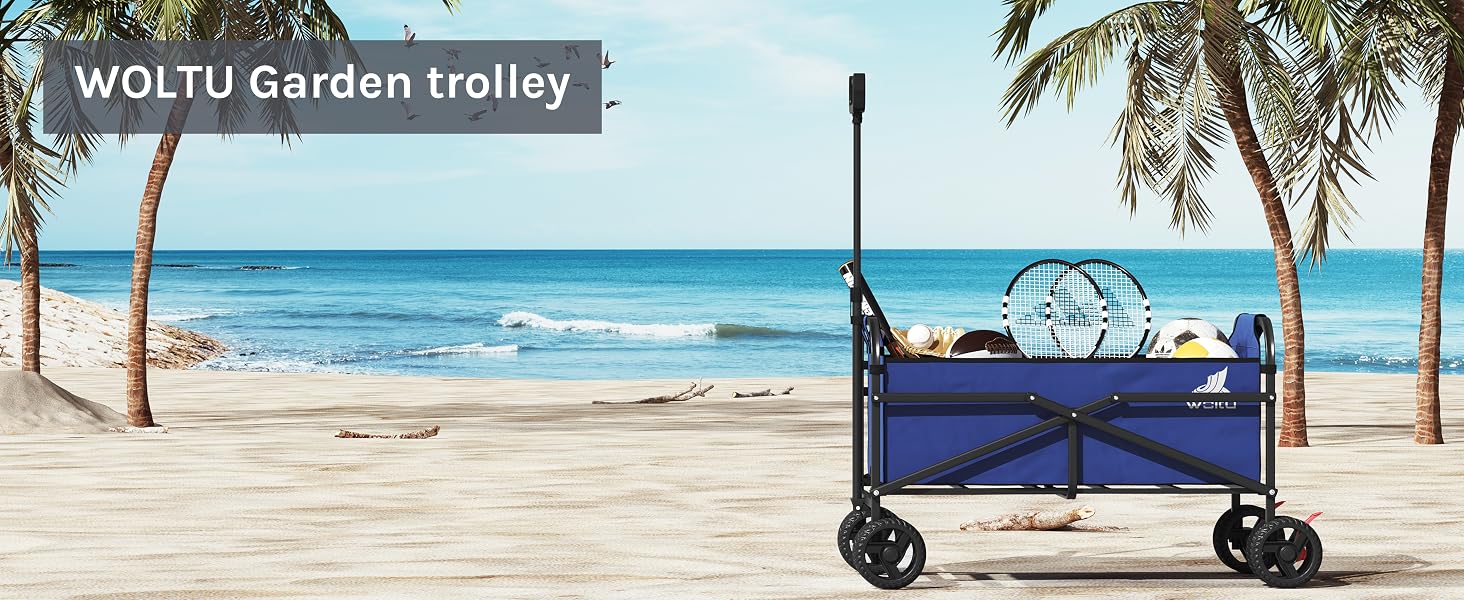 Blue folding utility wagon with large wheels on a sandy beach. Palm trees and ocean visible in background. 'WOLTU Garden trolley' text overlay.