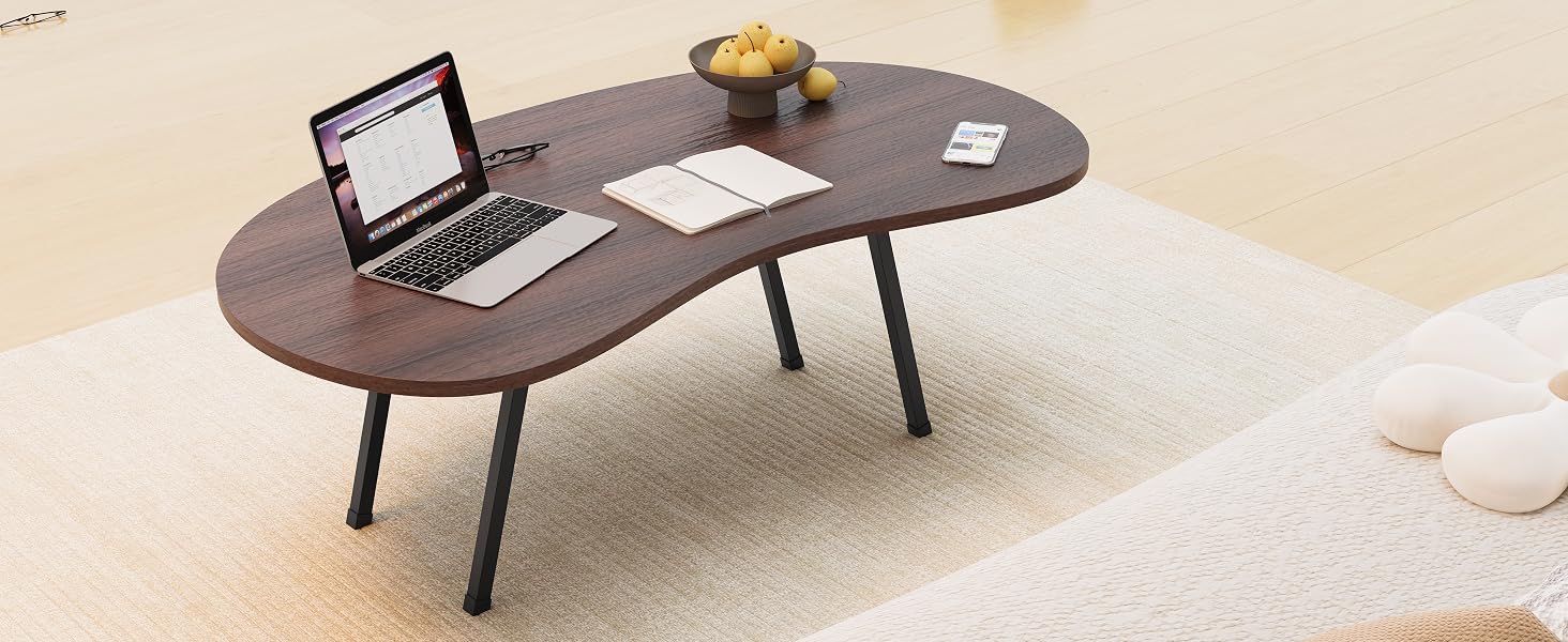 unique oval coffee table creates an instant focal point