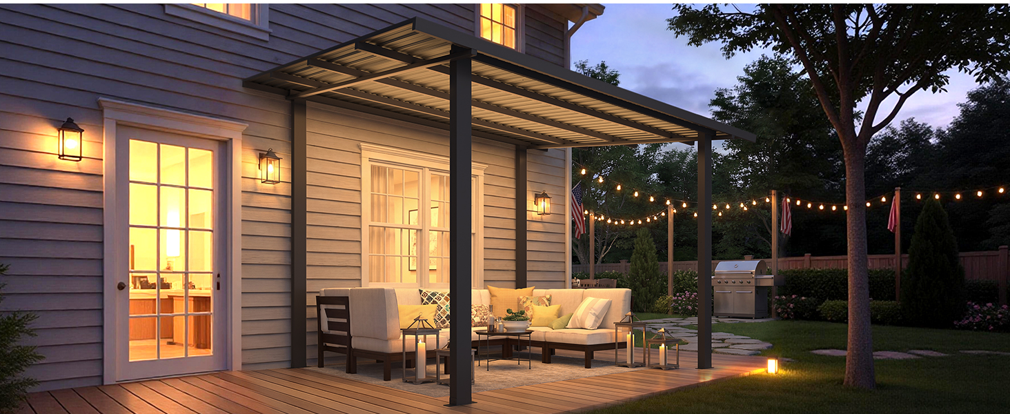 Residential outdoor patio area at dusk with illuminated windows, covered pergola structure, dining furniture, and ambient lighting creating evening ambiance in modern home setting.