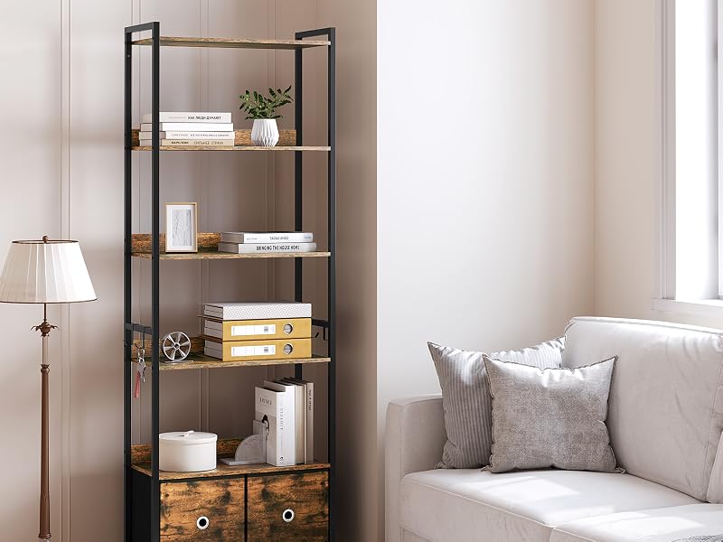 Black metal shelving unit with four open shelves and lower closed cabinet storage, displaying home décor items. Positioned next to cream upholstered sofa with gray pillows in minimalist interior setting.