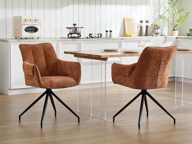 Modern living room furniture set featuring brown upholstered armchairs with metal spider-leg bases against white interior background.