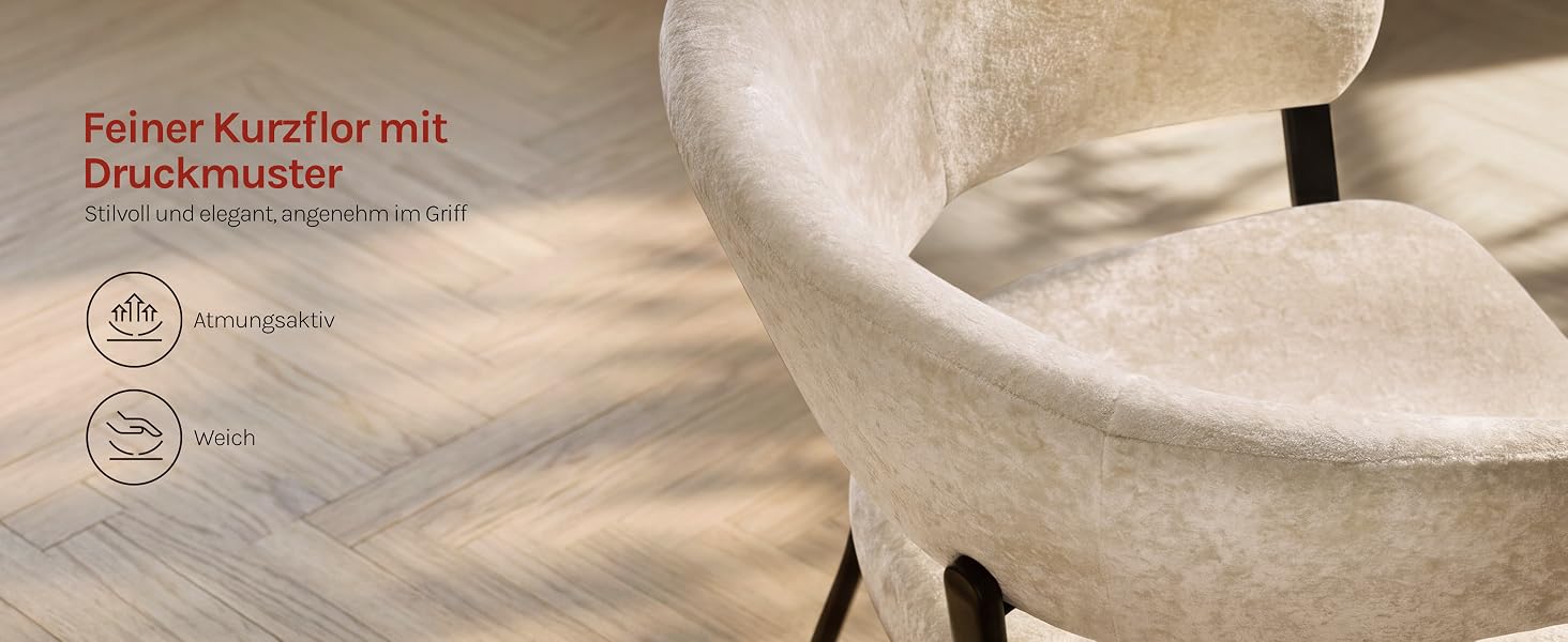 Der Text lautet „Feiner Kurzflor mit Druckmuster“. Nahaufnahme eines beige/cremefarbenen Stoffes mit Textur und aufgedruckten Musterdetails. Das Produkt scheint ein Polstermöbel oder ein Textilmaterialmuster zu sein.