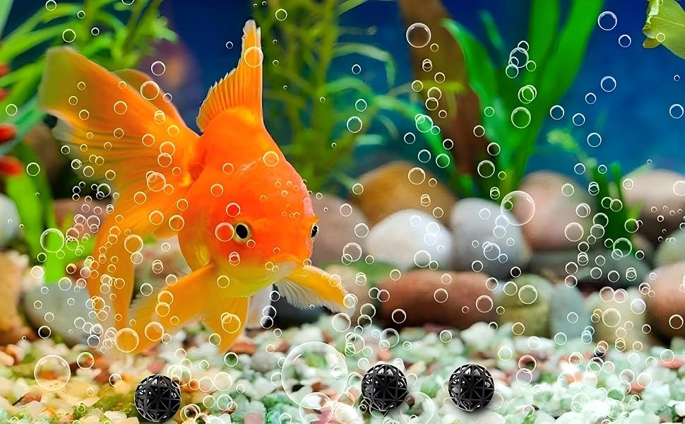 a goldfish is surrounded by bubbles in a fish tank.