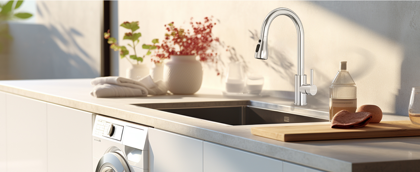 Modern kitchen countertop with sink, faucet, and wooden cutting board. Sunlight illuminates potted plants and kitchenware on the counter.