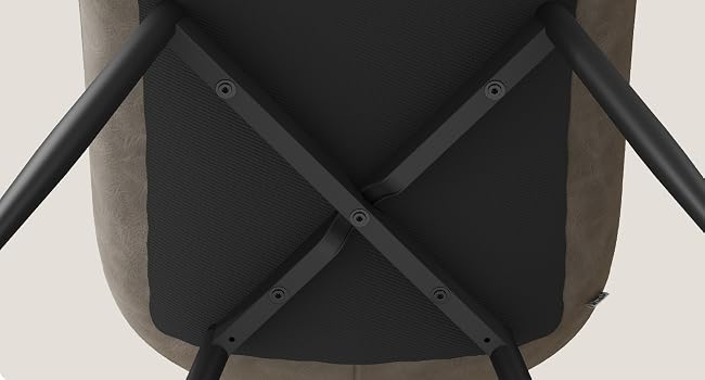 Close-up of black textured surface with cross-pattern design, showing material detail and construction pattern.