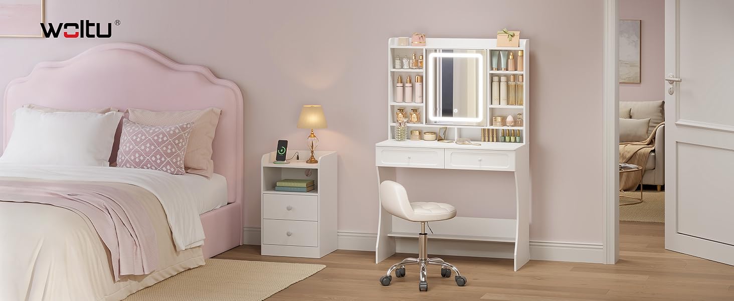 Text reads 'welby'. Bedroom interior with pink bedding, white bedside table with mirror, decorative items, and warm lighting in minimalist design.
