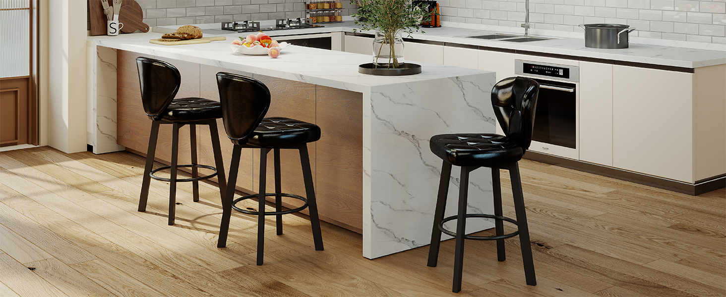 Interior design photo showing modern dining space with wooden flooring, white walls, and black chairs around white dining table.
