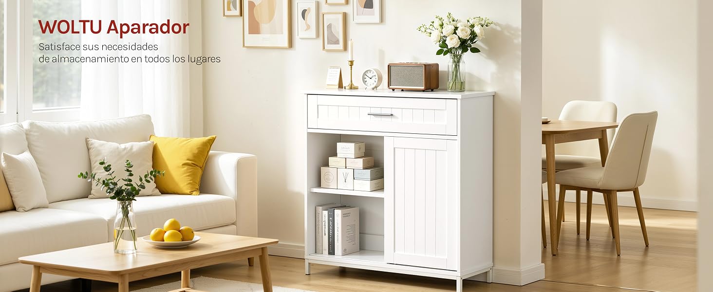 El texto dice «WOLTU Apérador». Interior luminoso de la sala de estar con armario de almacenamiento blanco, sillas de madera, detalles en amarillo y decoración neutra.
