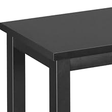 the [ unused0 ] table is a modern design with a black finish.