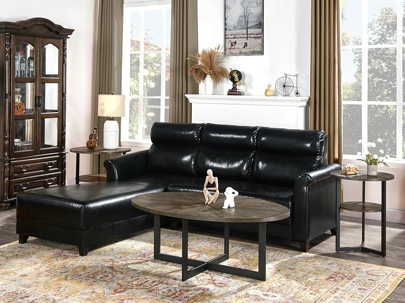 Living room with black leather sectional sofa, oval wooden coffee table, and patterned area rug. Room features white walls, large windows, and decorative elements including a curio cabinet and wall art.