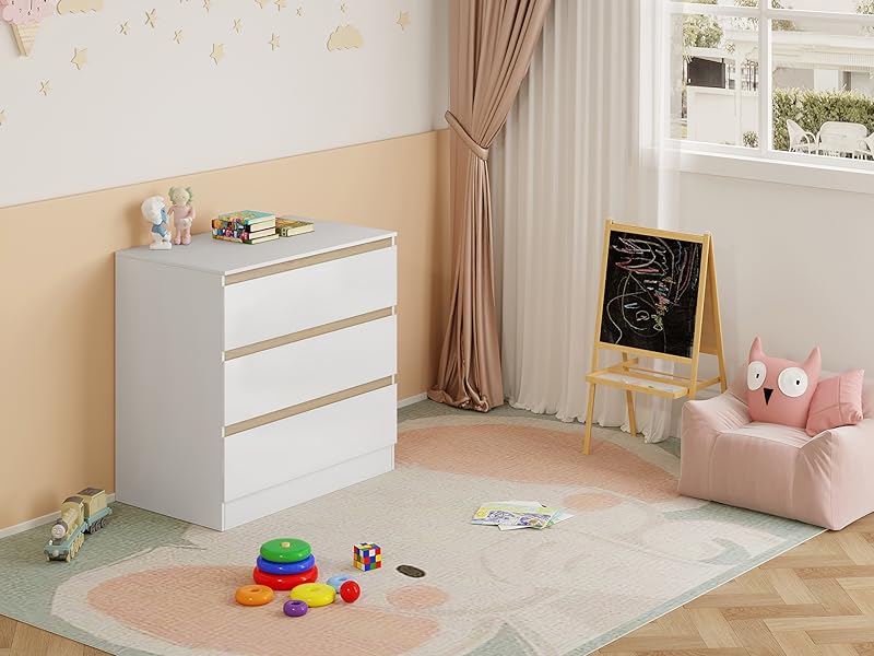 Children's bedroom with white dresser, beige curtains, and play area featuring colorful toys on a light-colored rug.