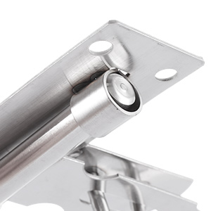 Close-up view of a silver-colored metal door latch mechanism mounted on a white surface, showing the barrel and mounting plate.