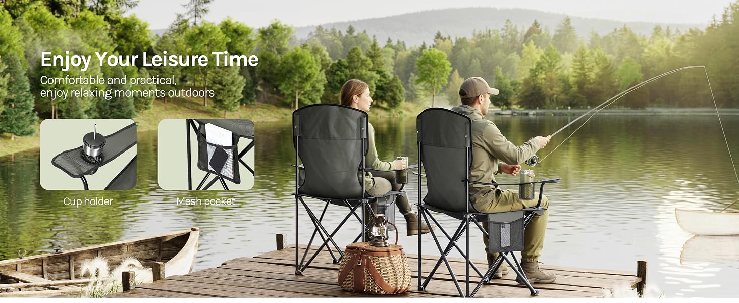 Outdoor scene showing four people sitting in camping chairs by a lake or river, enjoying leisure time in nature with natural landscape background.