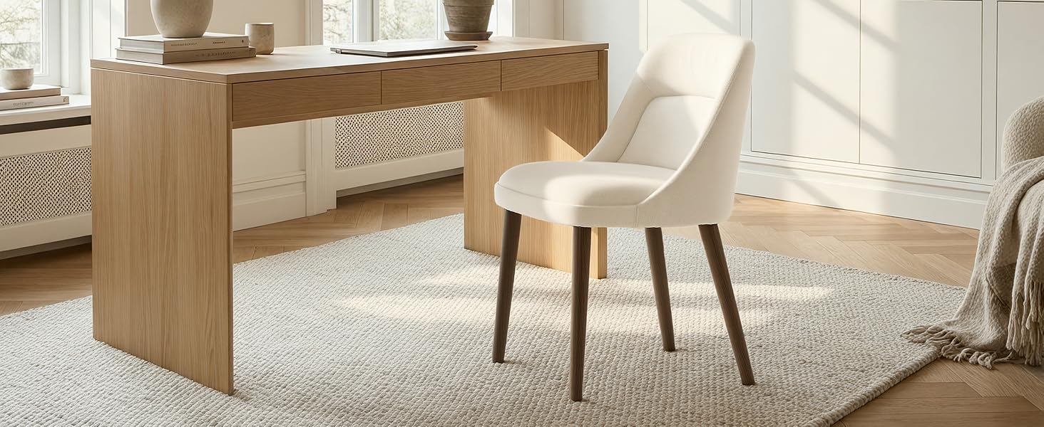 Modern minimalist interior space with beige and white color scheme, featuring contemporary furniture and natural lighting.