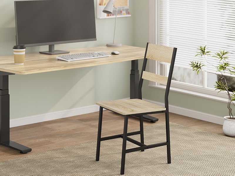 Modern desk setup with light wood surface and black metal frame, paired with matching chair featuring wood seat and black metal frame.