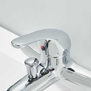 Chrome bathroom faucet with curved spout and two-handle design. Visible on a white surface, showcasing its sleek and modern appearance.