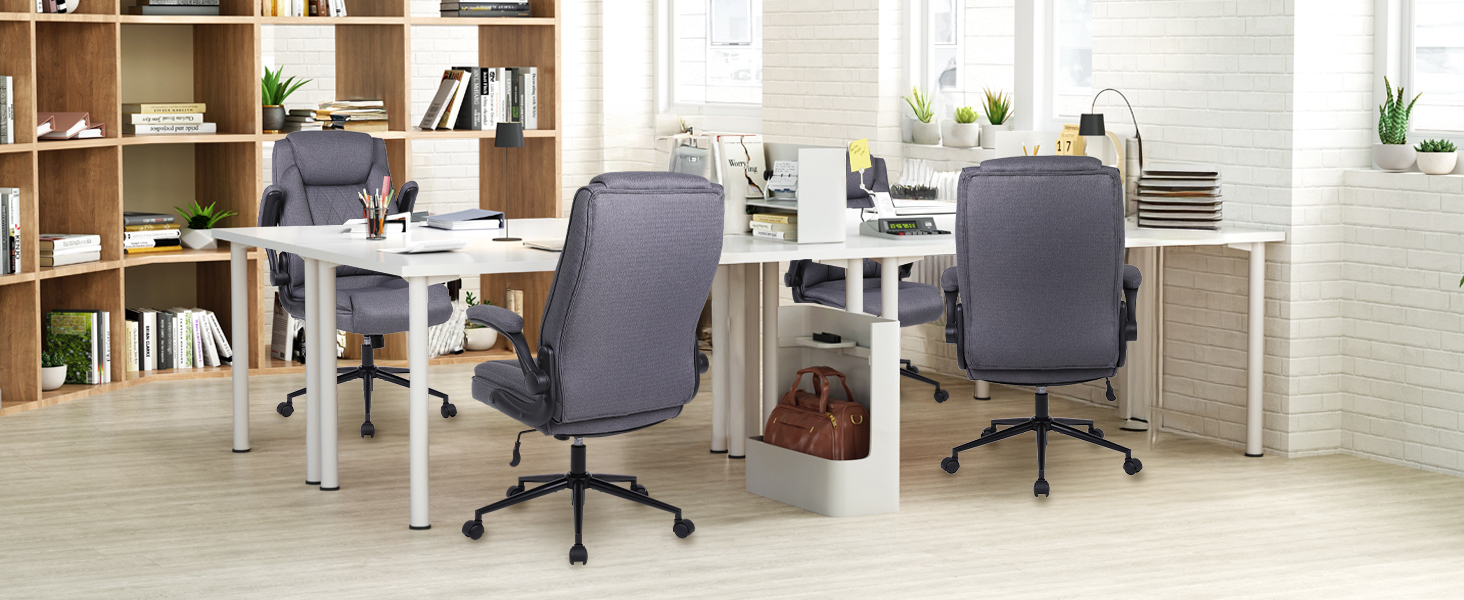 a white desk with two chairs and a white desk with a book shelf.