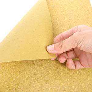Series of images showing hands interacting with a yellow cleaning cloth or duster, demonstrating various wiping and cleaning motions.