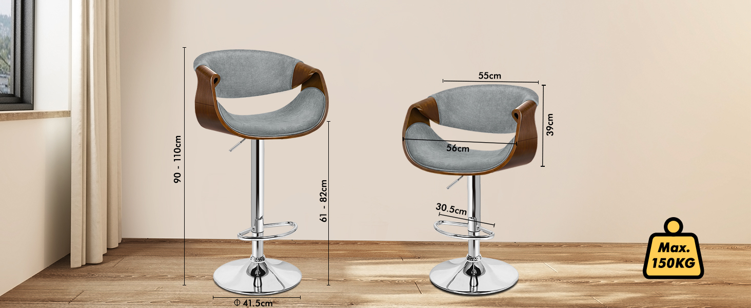 Modern interior scene featuring curved grey upholstered bar stools with chrome bases arranged in front of a light-colored counter or bar area.