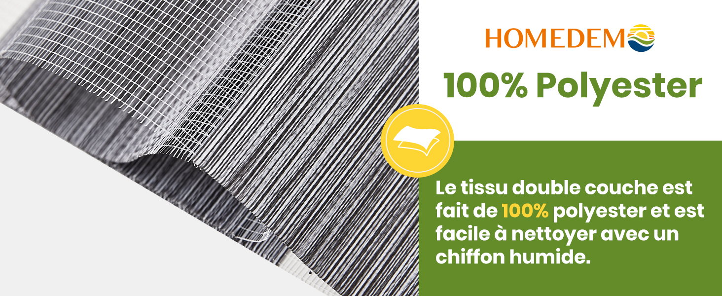Gros plan d'un tissu texturé gris étiqueté comme 100 % polyester, présentant de fines rayures et des détails de tissage