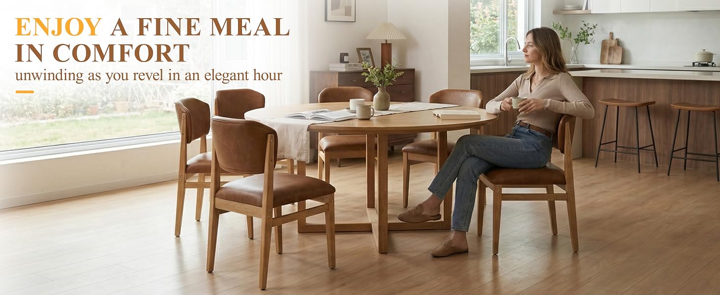 Text reads "ENJOY A FINE MEAL IN COMFORT" with tagline about dining. Shows modern dining room with wooden table, chairs, and two people seated at table in warm interior lighting.