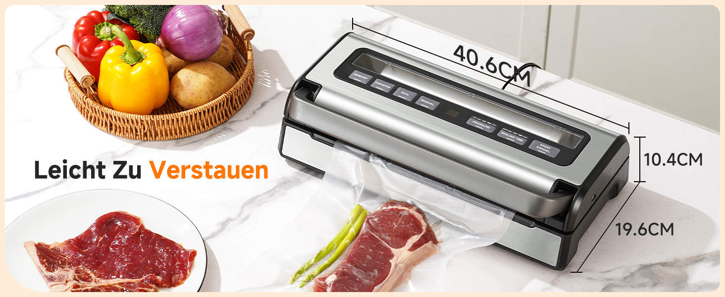 Der Text lautet „Leicht Zu Verstaufen“ mit den Abmessungen „40,6 x 19,4 cm“. Die abgebildete Vakuumiermaschine enthält frische Produkte und Fleisch zur Konservierung.