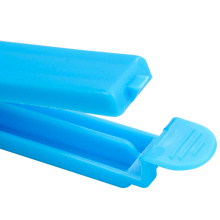 Close-up of bright blue plastic ice pop molds or freezer pops, showing the cylindrical shape and rounded end.