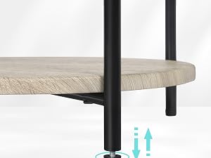 Adjustable table leg system.
[SENTENCE 15] Black metal legs with wooden tabletop.
[SENTENCE 16] Arrows indicate height adjustment capability.
[SENTENCE 17] Close-up of adjustment mechanism shown.