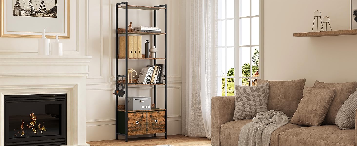 Modern living room interior featuring fireplace with decorative items, tall shelving unit, grey upholstered sofa, table lamp, and neutral color palette throughout space.