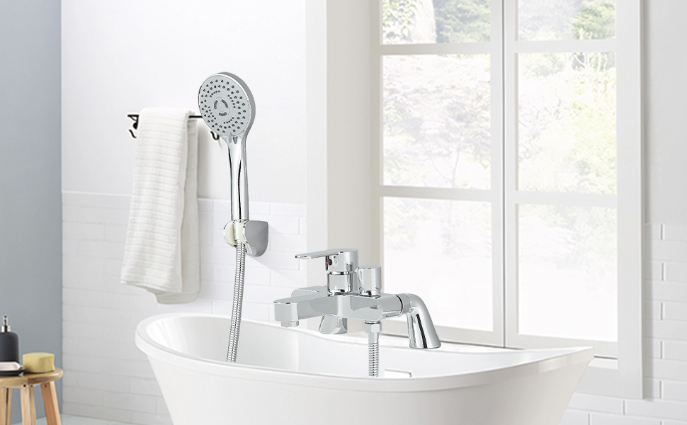 Modern white bathroom interior featuring glass shower enclosure, white fixtures, and natural light from windows. Blue-gray walls complement the clean design.