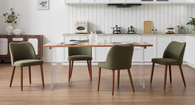Multiple views of modern dining chairs with wooden legs and upholstered seats shown in various arrangements against white wainscoted wall background.