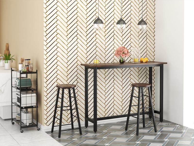 a table with two stools and a bar stool.