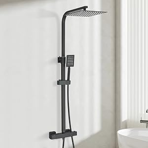 Black rainfall showerhead system with handheld shower attachment mounted on white bathroom wall, demonstrating modern fixture installation.