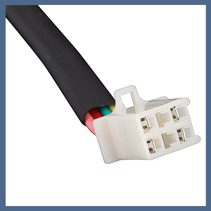Close-up of a black cable with three colored wires (red, green, blue) connected to a white plastic connector with multiple pins.