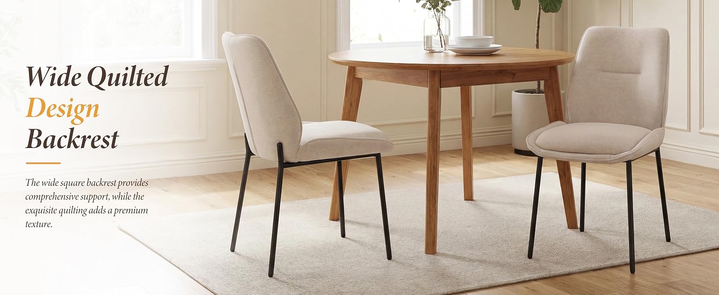 Text reads 'Wide Quilted' 'Design' 'Backrest'. Two upholstered dining chairs with quilted backrest design, curved legs, in cream/beige fabric against minimalist interior setting with wooden table.